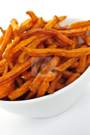 To use this stock image in your creative project, please select the size you need over to the right and click the "Add to Cart" button.
Your downloaded image will come with the Cutcaster watermark removed so don’t worry about the watermark you see on this page. Sweet potato fries stock photo, Closeup of sweet potato or yam fries in white bowl by Elena Elisseeva