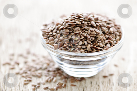 To use this stock image in your creative project, please select the size you need over to the right and click the "Add to Cart" button.
Your downloaded image will come with the Cutcaster watermark removed so don’t worry about the watermark you see on this page. Brown flax seed stock photo, Bowl full of brown flax seed or linseed by Elena Elisseeva