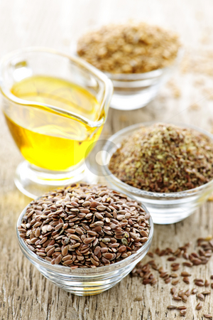 To use this stock image in your creative project, please select the size you need over to the right and click the "Add to Cart" button.
Your downloaded image will come with the Cutcaster watermark removed so don’t worry about the watermark you see on this page. Flax seeds and linseed oil stock photo, Bowls of whole and ground flax seed with linseed oil by Elena Elisseeva
