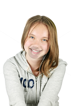 To use this stock image in your creative project, please select the size you need over to the right and click the "Add to Cart" button.
Your downloaded image will come with the Cutcaster watermark removed so don’t worry about the watermark you see on this page. Teenage girl with earphones stock photo, Isolated portrait of beautiful teenage girl listening to earphones by Elena Elisseeva