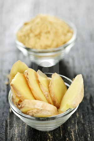 To use this stock image in your creative project, please select the size you need over to the right and click the "Add to Cart" button.
Your downloaded image will come with the Cutcaster watermark removed so don’t worry about the watermark you see on this page. Sliced and ground ginger stock photo, Sliced and ground fresh ginger root spice in glass bowls by Elena Elisseeva