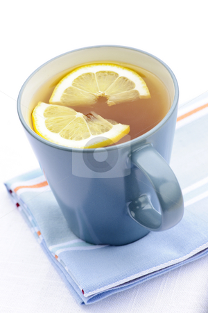 To use this stock image in your creative project, please select the size you need over to the right and click the "Add to Cart" button.
Your downloaded image will come with the Cutcaster watermark removed so don’t worry about the watermark you see on this page. Tea with lemon stock photo, Cup of fresh hot tea with lemon slices by Elena Elisseeva