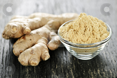 To use this stock image in your creative project, please select the size you need over to the right and click the "Add to Cart" button.
Your downloaded image will come with the Cutcaster watermark removed so don’t worry about the watermark you see on this page. Ginger root stock photo, Fresh and ground ginger root spice on wooden table by Elena Elisseeva