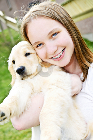 To use this stock image in your creative project, please select the size you need over to the right and click the "Add to Cart" button.
Your downloaded image will come with the Cutcaster watermark removed so don’t worry about the watermark you see on this page. Girl with puppy stock photo, Portrait of smiling teenage girl holding golden retriever puppy by Elena Elisseeva