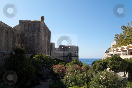 To use this stock image in your creative project, please select the size you need over to the right and click the "Add to Cart" button.
Your downloaded image will come with the Cutcaster watermark removed so don’t worry about the watermark you see on this page. Fort of Dubrovnik stock photo, The old city and its fort of Dubrovnik, Croatia by Kevin Tietz