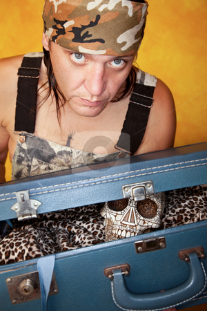To use this stock image in your creative project, please select the size you need over to the right and click the "Add to Cart" button.
Your downloaded image will come with the Cutcaster watermark removed so don’t worry about the watermark you see on this page. Man with skull in suitcase stock photo, Native American man with ornate skull in a suitcase by Scott Griessel