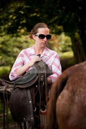 To use this stock image in your creative project, please select the size you need over to the right and click the "Add to Cart" button.
Your downloaded image will come with the Cutcaster watermark removed so don’t worry about the watermark you see on this page. Tourist in Costa Rica with Horse stock photo, Female tourist in Costa Rica with white horse by Scott Griessel