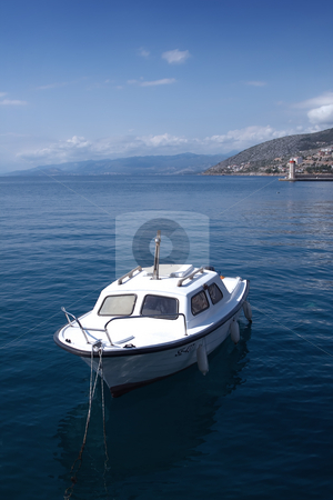 To use this stock image in your creative project, please select the size you need over to the right and click the "Add to Cart" button.
Your downloaded image will come with the Cutcaster watermark removed so don’t worry about the watermark you see on this page. Boat stock photo, Small boat near the shore by GPimages