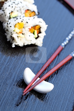 To use this stock image in your creative project, please select the size you need over to the right and click the "Add to Cart" button.
Your downloaded image will come with the Cutcaster watermark removed so don’t worry about the watermark you see on this page. Chopsticks sushi stock photo, Healthy very popular Japanese food sushi with chopsticks by Henrik Lehnerer