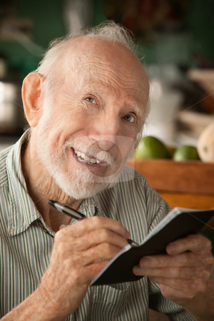 To use this stock image in your creative project, please select the size you need over to the right and click the "Add to Cart" button.
Your downloaded image will come with the Cutcaster watermark removed so don’t worry about the watermark you see on this page. Senior man with checkbook stock photo, Senior man at home with checkbook by Scott Griessel