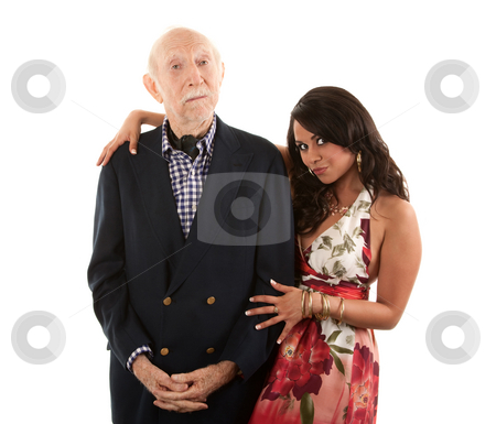 To use this stock image in your creative project, please select the size you need over to the right and click the "Add to Cart" button.
Your downloaded image will come with the Cutcaster watermark removed so don’t worry about the watermark you see on this page. Rich elderly man with gold-digger companion or wife stock photo, Rich elderly man with Hispanic gold-digger companion or wife by Scott Griessel
