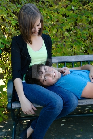 To use this stock image in your creative project, please select the size you need over to the right and click the "Add to Cart" button.
Your downloaded image will come with the Cutcaster watermark removed so don’t worry about the watermark you see on this page. Resting Boyfriend stock photo, A young teen lying on his girlfriend's lap by Richard Nelson