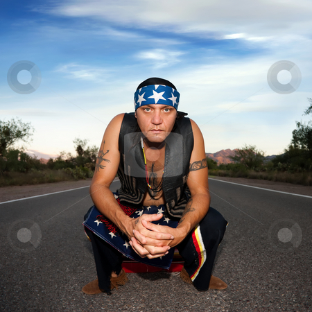 To use this stock image in your creative project, please select the size you need over to the right and click the "Add to Cart" button.
Your downloaded image will come with the Cutcaster watermark removed so don’t worry about the watermark you see on this page. Indigenous man in the middle of a road stock photo, Indigenous man squatting in the middle of a road by Scott Griessel