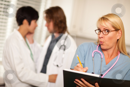 To use this stock image in your creative project, please select the size you need over to the right and click the "Add to Cart" button.
Your downloaded image will come with the Cutcaster watermark removed so don’t worry about the watermark you see on this page. Alarmed Medical Woman Witnesses Colleagues Inner Office Romance stock photo, Alarmed Medical Woman Witnesses Her Colleagues Inner Office Romance Display. by Andy Dean