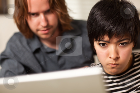 To use this stock image in your creative project, please select the size you need over to the right and click the "Add to Cart" button.
Your downloaded image will come with the Cutcaster watermark removed so don’t worry about the watermark you see on this page. Young Man and Diligent Woman Using Laptop Together stock photo, Young Man and Diligent Woman Using Laptop Computer Together. by Andy Dean