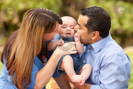 To use this stock image in your creative project, please select the size you need over to the right and click the "Add to Cart" button.
Your downloaded image will come with the Cutcaster watermark removed so don’t worry about the watermark you see on this page. Happy Mixed Race Parents Playing with Their Son stock photo, Happy Mixed Race Parents Playing with Their Giggling Son. by Andy Dean