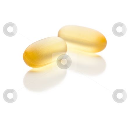 To use this stock image in your creative project, please select the size you need over to the right and click the "Add to Cart" button.
Your downloaded image will come with the Cutcaster watermark removed so don’t worry about the watermark you see on this page. Omega 3 Fish Oil Supplement Capsules on White stock photo, Omega 3 Fish Oil Supplement Capsules Isolated on a White Background. by Andy Dean