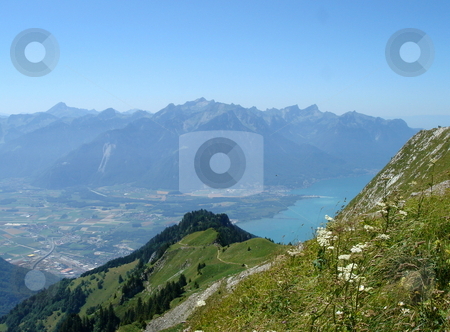 To use this stock image in your creative project, please select the size you need over to the right and click the "Add to Cart" button.
Your downloaded image will come with the Cutcaster watermark removed so don’t worry about the watermark you see on this page. View of Villereuse from the Alps mountain stock photo, View of Villereuse, Switzerland, and lake of Geneva from the Alps mountain by beautiful weather by Elenarts