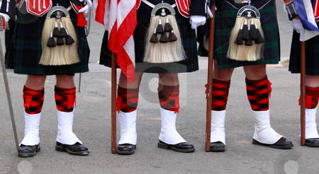 To use this stock image in your creative project, please select the size you need over to the right and click the "Add to Cart" button.
Your downloaded image will come with the Cutcaster watermark removed so don’t worry about the watermark you see on this page. Scottish Uniforms stock photo, English uniforms at the with their bright colors by Henrik Lehnerer