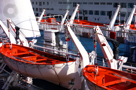 To use this stock image in your creative project, please select the size you need over to the right and click the "Add to Cart" button.
Your downloaded image will come with the Cutcaster watermark removed so don’t worry about the watermark you see on this page. Life raft on liner stock photo, Life raft on liner at day by Keng po Leung