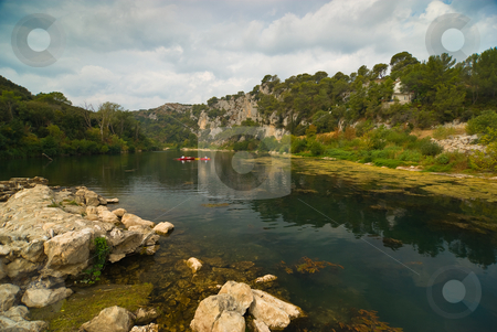 To use this stock image in your creative project, please select the size you need over to the right and click the "Add to Cart" button.
Your downloaded image will come with the Cutcaster watermark removed so don’t worry about the watermark you see on this page. Am Fluss Gardon, S?dfrankreich - At the gardon river, southern f stock photo, Der Gardon ist ein Fluss in Frankreich, der in der Region Languedoc-Roussillon verl?uft. - The Gardon or Gard (Occitan and French: Gardon, Gard) is a river in southern France. by Wolfgang Heidasch