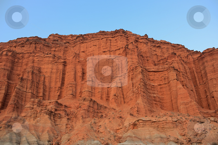 To use this stock image in your creative project, please select the size you need over to the right and click the "Add to Cart" button.
Your downloaded image will come with the Cutcaster watermark removed so don’t worry about the watermark you see on this page. High cliff in Argentina. stock photo, Cliff at twilight, ischigualasto, Argentina. by Pablo Caridad