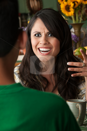 To use this stock image in your creative project, please select the size you need over to the right and click the "Add to Cart" button.
Your downloaded image will come with the Cutcaster watermark removed so don’t worry about the watermark you see on this page. Angry Latina Woman with Cofee or Tea and Male Companion stock photo, Angry Latina Woman at table in Kitchen with Coffee or Tea and Male Companion by Scott Griessel