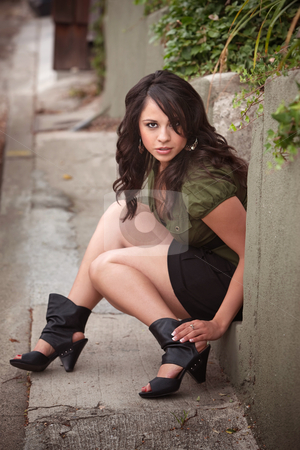 To use this stock image in your creative project, please select the size you need over to the right and click the "Add to Cart" button.
Your downloaded image will come with the Cutcaster watermark removed so don’t worry about the watermark you see on this page. Pretty Latina Woman stock photo, Pretty latina Woman Sitting on Step Outdoors by Scott Griessel