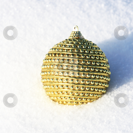 To use this stock image in your creative project, please select the size you need over to the right and click the "Add to Cart" button.
Your downloaded image will come with the Cutcaster watermark removed so don’t worry about the watermark you see on this page. Merry christmas card stock photo, Golden christmas bauble in snow by Viktor Thaut