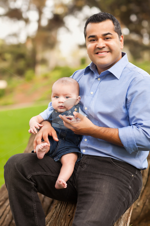 To use this stock image in your creative project, please select the size you need over to the right and click the "Add to Cart" button.
Your downloaded image will come with the Cutcaster watermark removed so don’t worry about the watermark you see on this page. Handsome Hispanic Father and Son Posing for A Portrait stock photo, Handsome Hispanic Father and Son Posing for A Portrait in the Park. by Andy Dean