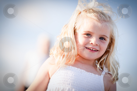 To use this stock image in your creative project, please select the size you need over to the right and click the "Add to Cart" button.
Your downloaded image will come with the Cutcaster watermark removed so don’t worry about the watermark you see on this page. Adorable Blue Eyed Girl Playing Outside stock photo, Adorable Blue Eyed Girl Playing Outside with Her Family. by Andy Dean