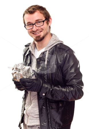 To use this stock image in your creative project, please select the size you need over to the right and click the "Add to Cart" button.
Your downloaded image will come with the Cutcaster watermark removed so don’t worry about the watermark you see on this page. Warmly Dressed Handsome Young Man with Gift stock photo, Warmly Dressed Handsome Young Man Holding Wrapped Gift Isolated on a White Background. by Andy Dean