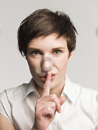To use this stock image in your creative project, please select the size you need over to the right and click the "Add to Cart" button.
Your downloaded image will come with the Cutcaster watermark removed so don’t worry about the watermark you see on this page. Portrait of a woman with a finger over her mouth stock photo, Portrait of a woman with a finger over her mouth by Anne-Louise Quarfoth