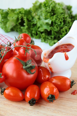 To use this stock image in your creative project, please select the size you need over to the right and click the "Add to Cart" button.
Your downloaded image will come with the Cutcaster watermark removed so don’t worry about the watermark you see on this page. Tomato of different varieties and sauce stock photo, Tomato of different varieties and sauce in a gravy boat by Olga Kriger
