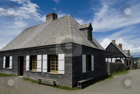 To use this stock image in your creative project, please select the size you need over to the right and click the "Add to Cart" button.
Your downloaded image will come with the Cutcaster watermark removed so don’t worry about the watermark you see on this page. Fort Louisburg stock photo, Houses and shops in the historic French fort of Louisburg, Nova Scotia, Canada. by Mary Lane