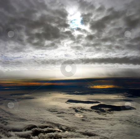 To use this stock image in your creative project, please select the size you need over to the right and click the "Add to Cart" button.
Your downloaded image will come with the Cutcaster watermark removed so don’t worry about the watermark you see on this page. Island in the Clouds stock photo, Weird and wild skyscape with islands poking off the clouds, off the coast of Vancouver, Canada. by Mary Lane