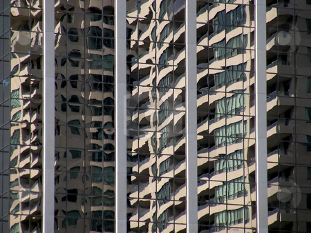 To use this stock image in your creative project, please select the size you need over to the right and click the "Add to Cart" button.
Your downloaded image will come with the Cutcaster watermark removed so don’t worry about the watermark you see on this page. Wavy Reflections stock photo, Building reflections looking very wavy, Toronto, Ontario, Canada. by Mary Lane
