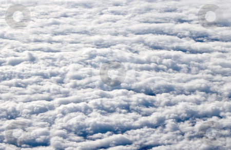 To use this stock image in your creative project, please select the size you need over to the right and click the "Add to Cart" button.
Your downloaded image will come with the Cutcaster watermark removed so don’t worry about the watermark you see on this page. Flying high above white clouds. stock photo, Flying high above white clouds. by Stephen Rees