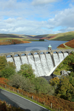 To use this stock image in your creative project, please select the size you need over to the right and click the "Add to Cart" button.
Your downloaded image will come with the Cutcaster watermark removed so don’t worry about the watermark you see on this page. Craig Goch reservoir with water overflowing, Elan Valley, Wales. stock photo, Craig Goch reservoir with water overflowing, Elan Valley, Wales. by Stephen Rees
