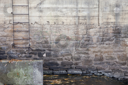 To use this stock image in your creative project, please select the size you need over to the right and click the "Add to Cart" button.
Your downloaded image will come with the Cutcaster watermark removed so don’t worry about the watermark you see on this page. Lader and river dam wall stock photo, Rusty metal ladder on old concrete and stone wall of a river dam by Marek Uliasz