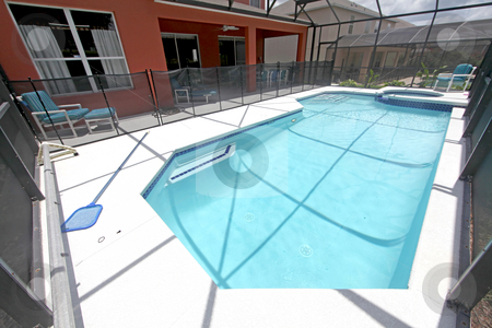 To use this stock image in your creative project, please select the size you need over to the right and click the "Add to Cart" button.
Your downloaded image will come with the Cutcaster watermark removed so don’t worry about the watermark you see on this page. Pool, Spa and Lanai stock photo, A Swimming Pool, Spa and Lanai in Florida by Lucy Clark