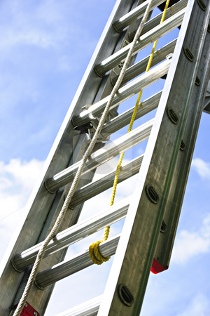 To use this stock image in your creative project, please select the size you need over to the right and click the "Add to Cart" button.
Your downloaded image will come with the Cutcaster watermark removed so don’t worry about the watermark you see on this page. Construction ladder stock photo, Closeup of construction aluminum extension ladder against blue sky by Elena Elisseeva