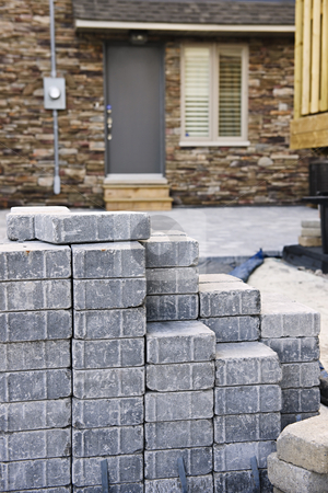 To use this stock image in your creative project, please select the size you need over to the right and click the "Add to Cart" button.
Your downloaded image will come with the Cutcaster watermark removed so don’t worry about the watermark you see on this page. Interlocking stone driveway stock photo, Stacks of interlocking stones for installing driveway landscaping by Elena Elisseeva