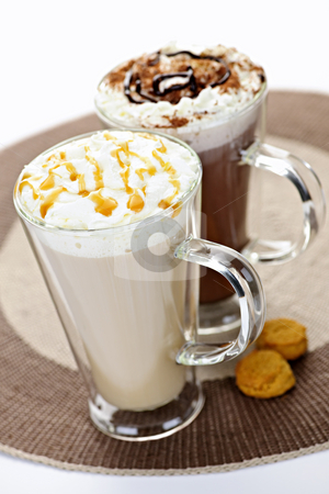 To use this stock image in your creative project, please select the size you need over to the right and click the "Add to Cart" button.
Your downloaded image will come with the Cutcaster watermark removed so don’t worry about the watermark you see on this page. Hot chocolate and coffee beverages stock photo, Hot beverages of coffee and chocolate with whipped cream by Elena Elisseeva