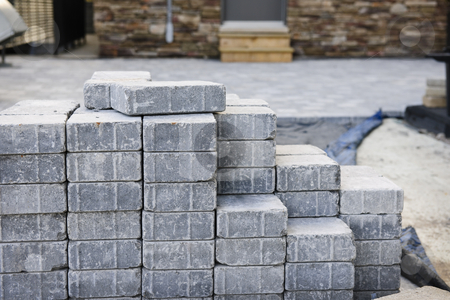 To use this stock image in your creative project, please select the size you need over to the right and click the "Add to Cart" button.
Your downloaded image will come with the Cutcaster watermark removed so don’t worry about the watermark you see on this page. Interlocking stone driveway stock photo, Stacks of interlocking stones for installing driveway landscaping by Elena Elisseeva