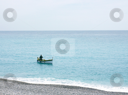To use this stock image in your creative project, please select the size you need over to the right and click the "Add to Cart" button.
Your downloaded image will come with the Cutcaster watermark removed so don’t worry about the watermark you see on this page. Fishing man at Nice, France stock photo, Fishing man alone in a small white boat on the clear mediterranean sea by beautiful weather at Nice, France by Elenarts