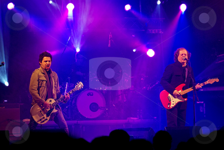 To use this stock image in your creative project, please select the size you need over to the right and click the "Add to Cart" button.
Your downloaded image will come with the Cutcaster watermark removed so don’t worry about the watermark you see on this page. Portuguese rock band . stock photo, Portuguese rock band in concert. by Inacio Pires