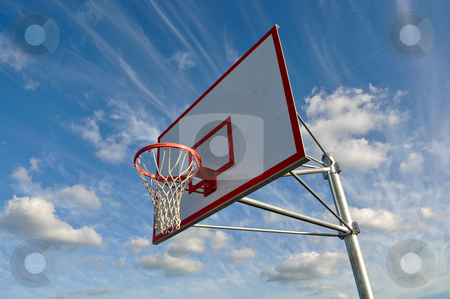To use this stock image in your creative project, please select the size you need over to the right and click the "Add to Cart" button.
Your downloaded image will come with the Cutcaster watermark removed so don’t worry about the watermark you see on this page. Basketball Hoop with Clouds stock photo, Basketball Hoop with Clouds by Brandon Bourdages