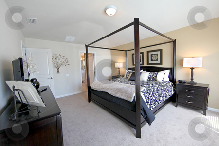 To use this stock image in your creative project, please select the size you need over to the right and click the "Add to Cart" button.
Your downloaded image will come with the Cutcaster watermark removed so don’t worry about the watermark you see on this page. King Master Bedroom stock photo, A King Master Bedroom, interior shot of a Home by Lucy Clark