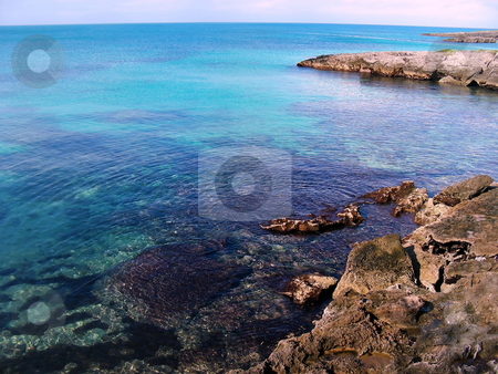 To use this stock image in your creative project, please select the size you need over to the right and click the "Add to Cart" button.
Your downloaded image will come with the Cutcaster watermark removed so don’t worry about the watermark you see on this page. Rocky North Shore stock photo, The rocky north shore of Bermuda. There are an amazing number of variations of blue in the water. by Mary Lane